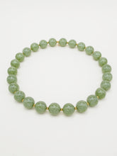 Bichou perles rondes pailletées et dorées (7 coloris)