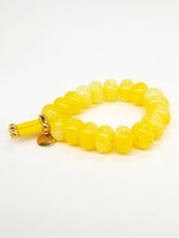 Elastique coloré et perles donuts colorées (10 coloris)