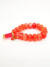 Elastique coloré et perles donuts colorées (10 coloris)