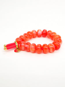 Elastique coloré et perles donuts colorées (10 coloris)