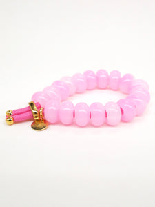 Elastique coloré et perles donuts colorées (10 coloris)